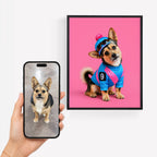Phone photo of a small tan and black dog beside personalized pet art showing the dog in a colorful blue and pink sports outfit